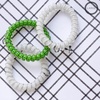 image:imageTELETIES  Small Spiral Hair Coils  Sports Collection  Ponytail Holder Hair Ties for Women  Phone Cord Hair Ties  Strong Grip No Rip Water Resistant No Crease  3 pack  FootballLacrosse  Large