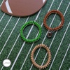 image:imageTELETIES  Small Spiral Hair Coils  Sports Collection  Ponytail Holder Hair Ties for Women  Phone Cord Hair Ties  Strong Grip No Rip Water Resistant No Crease  3 pack  FootballFootball  Large