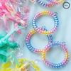 image:imageTELETIES  Spiral Hair Coils  Ponytail Holder Hair Ties for Women  Phone Cord Hair Ties  Strong Grip No Rip Water Resistant No Crease Hair Tie Coils  3 pack Small TortoiseEat Glitter for Breakfast